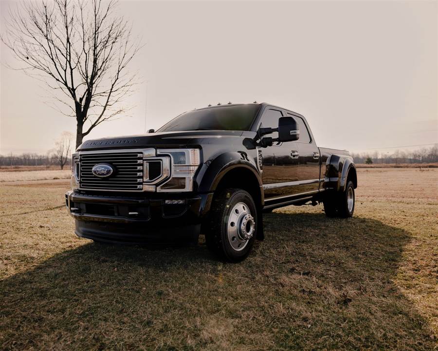 Black heavy-duty dually pickup built for hot shot freight
