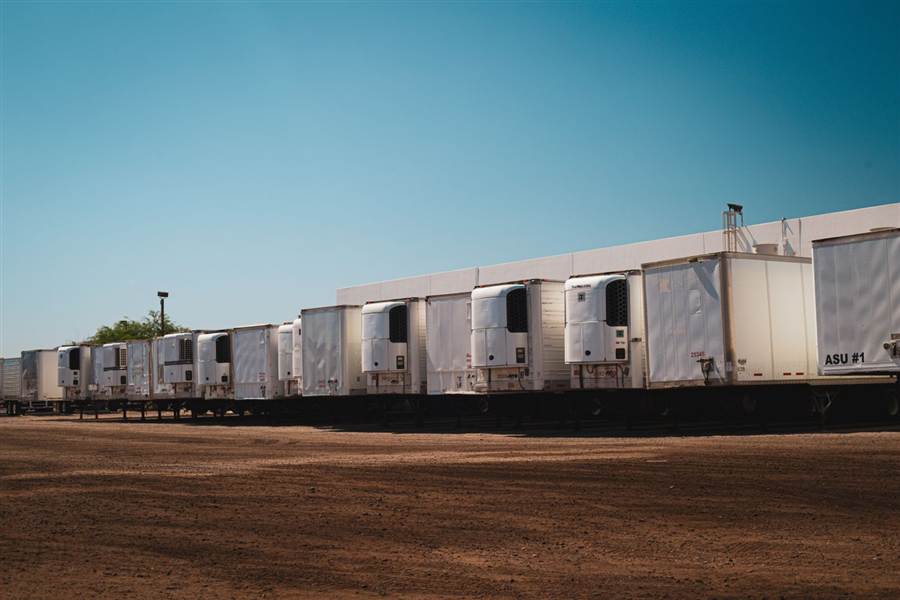 Row of refrigerated trailers with reefer units